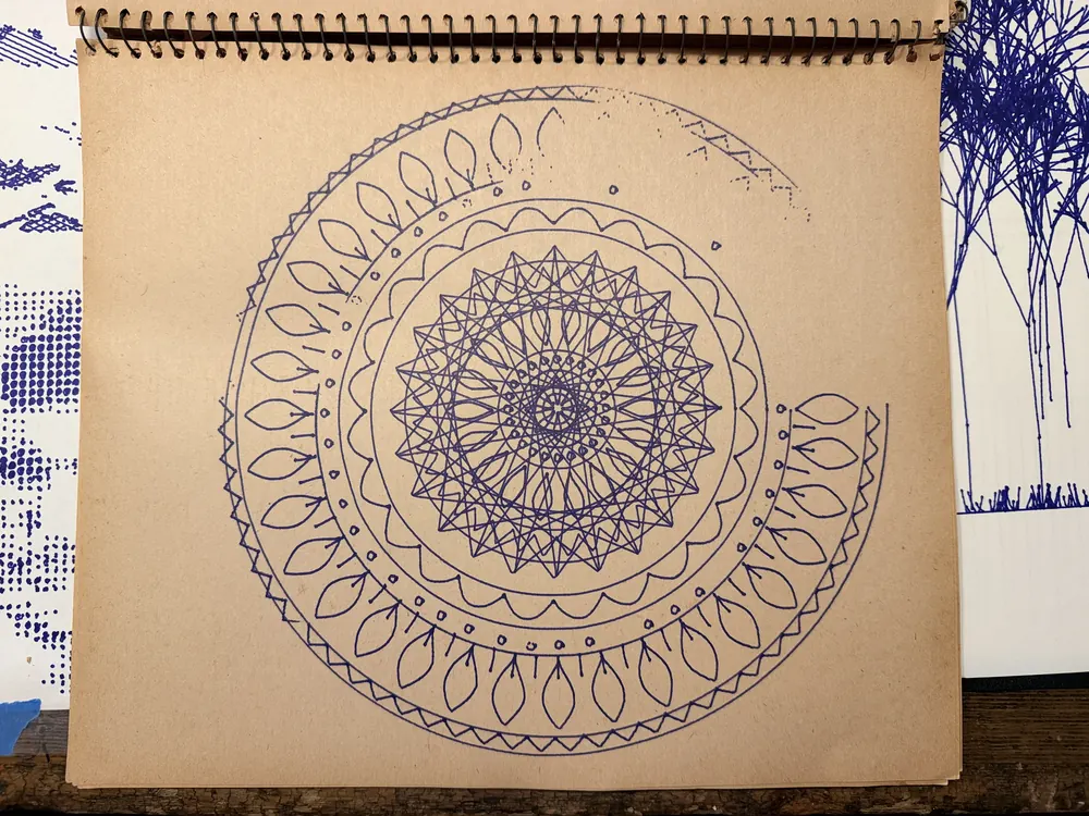 The finished sheet: Mandala, in blue ink